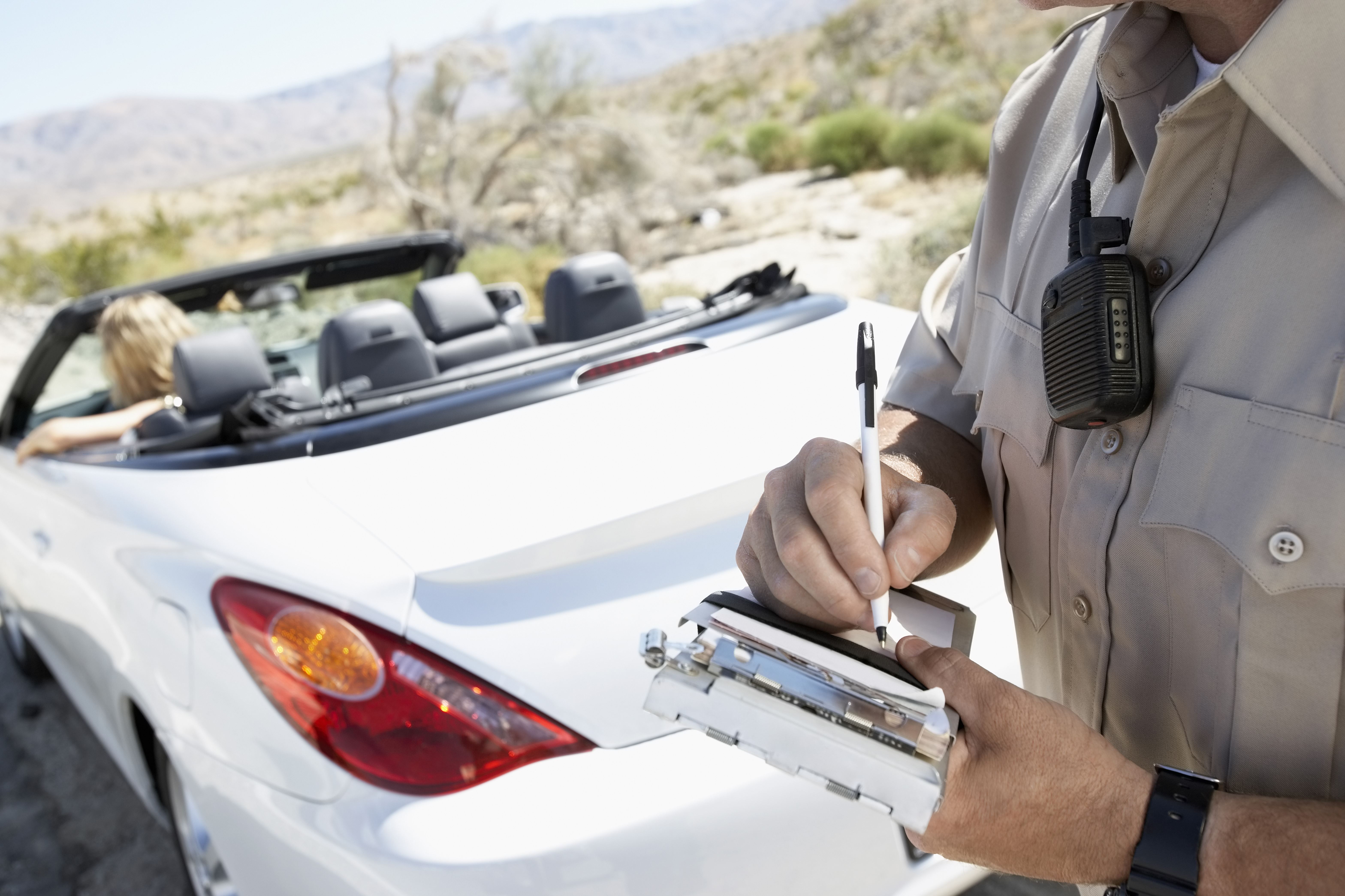 Police giving a ticket for an improper turn